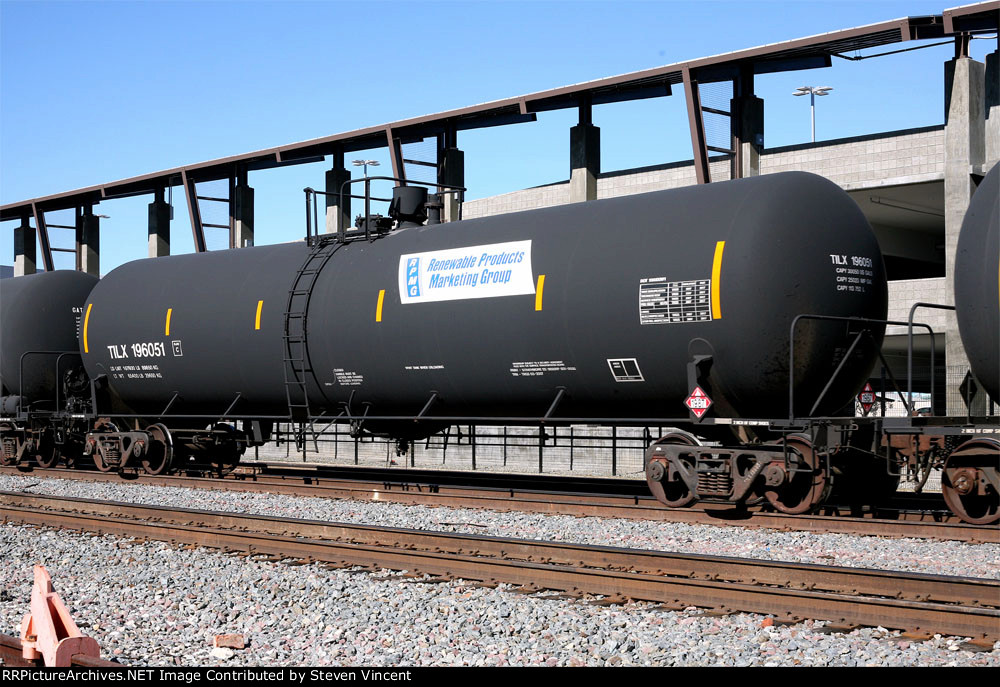 Tank in empty unit ethanol train TILX #196051. RGMP logo.